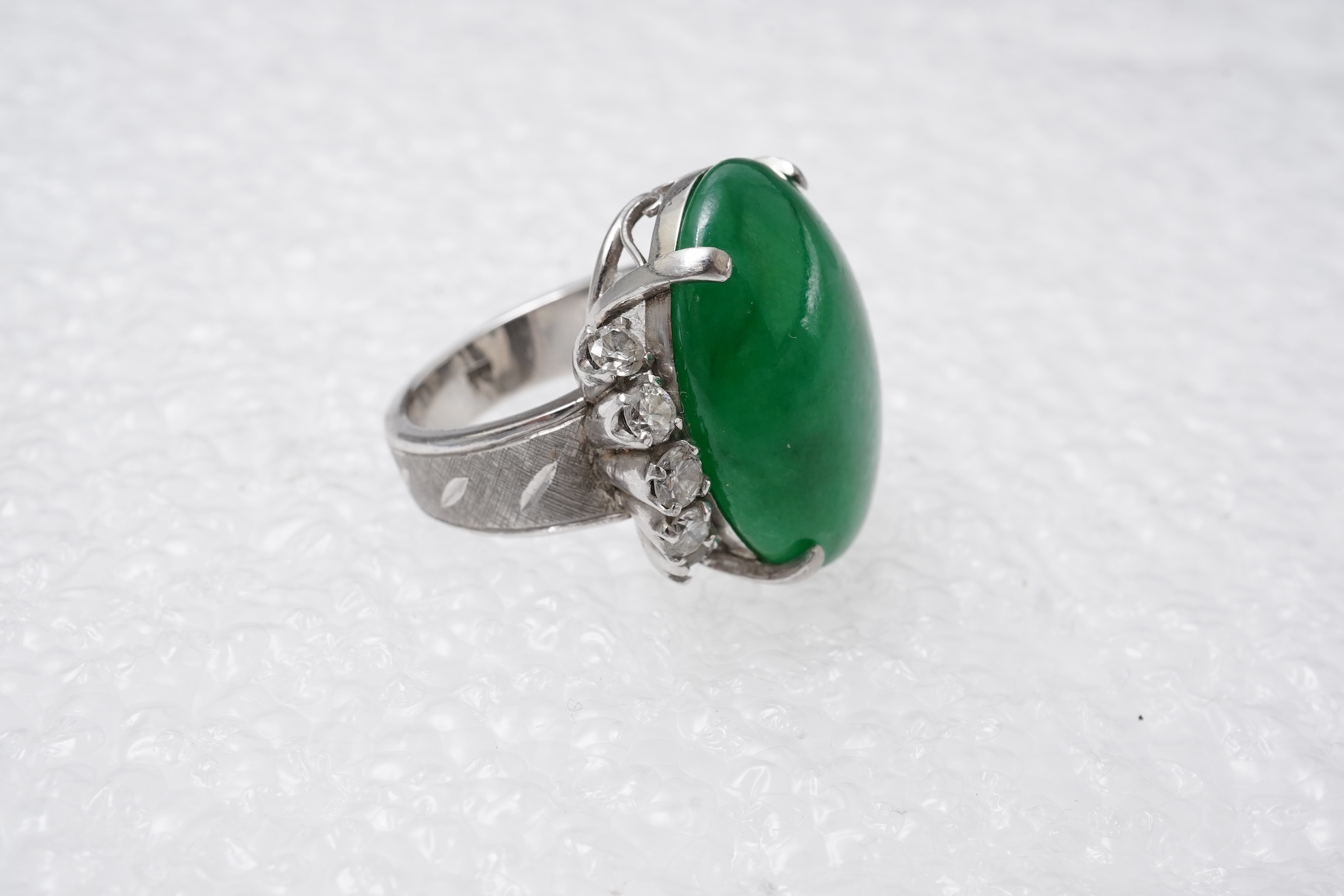 A jadeite and diamond ring, 1960s